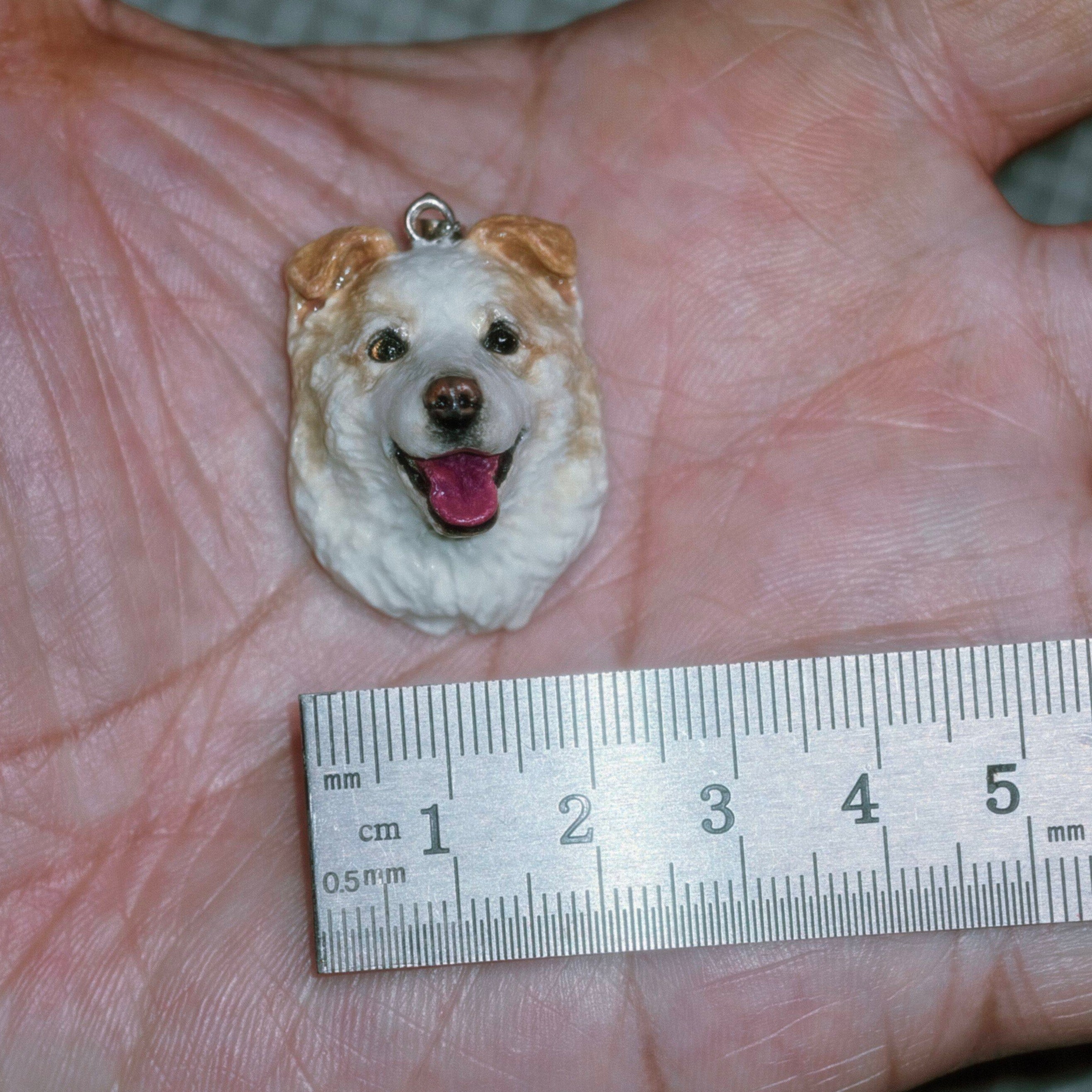 Custom clay Golden Retriever portrait pendant on silver-colored metal chain